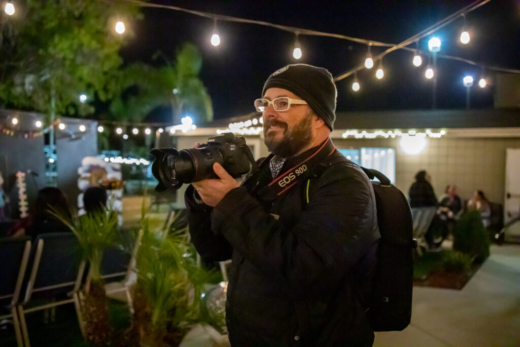 Ira bowman holding camera